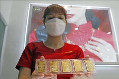 Giao dịch vàng tại doanh nghiệp. (Ảnh: PV/Vietnam+)