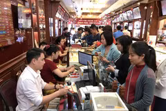 Giao dịch vàng tại doanh nghiệp. (Ảnh: PV/Vietnam+)