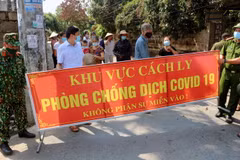 Dỡ bỏ phong tỏa, kết thúc cách ly y tế. (Ảnh: Đại Nghĩa/TTXVN)