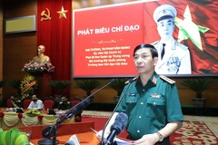 Đại tướng Phan Văn Giang, Ủy viên Bộ Chính trị, Bộ trưởng Bộ Quốc phòng đọc tham luận. (Ảnh: Trọng Đức/TTXVN)