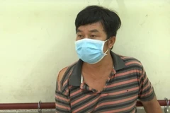 Đối tượng Quách Thái khi bị bắt. (Ảnh: TTXVN phát)