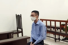 Bị cáo Trần Hoàng Minh tại phiên tòa. (Ảnh: Kim Anh/TTXVN)