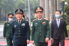 Thượng tướng Phan Văn Giang, Bộ trưởng Bộ Quốc phòng Việt Nam và Thượng tướng Ngụy Phượng Hòa, Bộ trưởng Bộ Quốc phòng Trung Quốc. (Ảnh: Trọng Đức/TTXVN)