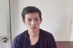 Đối tượng Nguyễn Văn Đức tại cơ quan công an. (Ảnh: Lê Đức Hoảnh/TTXVN)