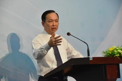 Phó Thống đốc Ngân hàng Nhà nước Đào Minh Tú. (Ảnh: Hứa Chung/TTXVN)