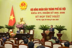 Ông Đinh Tiến Dũng, Ủy viên Bộ Chính trị, Bí thư Thành ủy Hà Nội phát biểu Kỳ họp thứ nhất để hoàn thiện các chức danh chủ chốt của HĐND, UBND và một số nhiệm vụ trọng tâm khác. (Ảnh: Nguyễn Điệp/TTXVN)