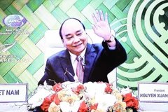 Chủ tịch nước Nguyễn Xuân Phúc tại Cuộc họp. (Ảnh: Thống Nhất/TTXVN)