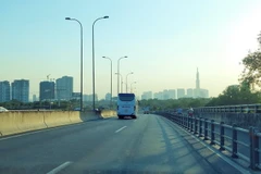 Phương tiện đi trên cao tốc Thành phố Hồ Chí Minh-Long Thành-Dầu Giây. (Ảnh: Tiến Lực/TTXVN)