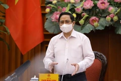 Thủ tướng Phạm Minh Chính phát biểu chỉ đạo tại cuộc họp khẩn về các biện pháp phòng, chống COVID-19 trước tình hình dịch bệnh đang có diễn biến phức tạp ngày 30/4. (Ảnh: Văn Điệp/TTXVN)