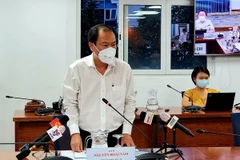Bác sỹ Nguyễn Hoài Nam, Phó Giám đốc Sở Y tế Thành phố Hồ Chí Minh thông tin tại buổi họp báo. (Ảnh: Thành Chung/TTXVN)