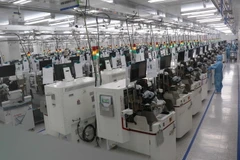 Công ty TNHH ITM Semiconductor Việt Nam, khu công nghiệp VSIP, tỉnh Bắc Ninh duy trì, đảm bảo hoạt động sản xuất. (Ảnh: Thái Hùng/TTXVN)