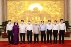 Các vị lãnh đạo Đảng, Nhà nước và các đại biểu dự Phiên họp. (Ảnh: Trí Dũng/TTXVN)