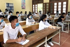 Thí sinh dự thi tốt nghiệp Trường Trung học phổ thông năm 2020. (Ảnh: Quang Cường/TTXVN)