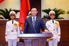 Ông Vương Đình Huệ tuyên thệ nhậm chức Chủ tịch Quốc hội khóa XV. (Ảnh: Doãn Tấn/TTXVN)
