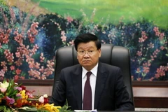 Tổng Bí thư Đảng Nhân dân Cách mạng Lào Thongloun Sisoulith điện đàm với Tổng Bí thư Ban Chấp hành Trung ương Đảng Cộng sản Việt Nam Nguyễn Phú Trọng. (Ảnh: Phạm Kiên/TTXVN)