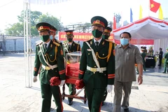 Lễ an táng các anh hùng liệt sỹ tại Nghĩa trang Liệt sỹ Quốc gia Đường 9. Ảnh minh họa. (Ảnh: Hồ Cầu/TTXVN)