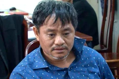 Đỗ Văn Minh tại cơ quan công an.