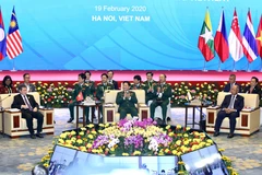 Đại tướng Ngô Xuân Lịch, Ủy viên Bộ Chính trị, Phó Bí thư Quân uỷ Trung ương, Bộ trưởng Bộ Quốc phòng Việt Nam phát biểu khai mạc. (Ảnh: Dương Giang/TTXVN) 