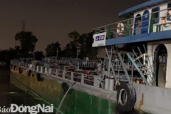 Hiện trường xảy ra vụ cháy tàu chở xăng trên sông Đồng Nai. (Nguồn: báo Đồng Nai)