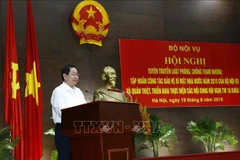 Ủy viên Trung ương Đảng, Bộ trưởng Bộ Nội vụ Lê Vĩnh Tân phát biểu khai mạc hội nghị. (Ảnh: Văn Điệp/TTXVN)