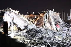 Hiện trường vụ sập giàn giáo. (Ảnh: Hoàng Ngọc/TTXVN)