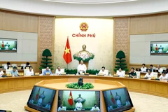 Thủ tướng Nguyễn Xuân Phúc chủ trì Phiên họp Chính phủ về chuyên đề xây dựng pháp luật. (Ảnh: Thống Nhất/TTXVN)