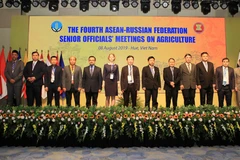 Các quan chức cấp cao nông lâm nghiệp và Liên bang Nga chụp ảnh lưu niệm tại Hội nghị. (Ảnh: Hồ Cầu/TTXVN)