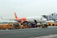 Máy bay của Vietjet tại sân bay Cát Bi. (Ảnh: An Đăng/TTXVN)