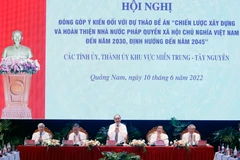 Chủ tịch nước Nguyễn Xuân Phúc chủ trì hội nghị. (Ảnh: Thống Nhất/TTXVN)