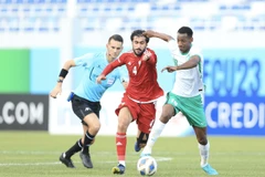 U23 Saudi Arabia (áo trắng) trở thành đối thủ của U23 Việt Nam tại tứ kết. (Nguồn: vff.org.vn)