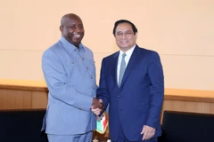 Thủ tướng Phạm Minh Chính gặp Tổng thống Burundi Evariste Ndayishimiye. (Ảnh: Dương Giang/TTXVN)