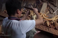 Người dân tại một làng nghề ở Hà Nội. (Nguồn: Vietnam+)