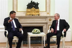 Tổng thống Nga Vladimir Putin (phải) trong cuộc gặp Chủ tịch Trung Quốc Tập Cận Bình tại thủ đô Moskva, ngày 20/3/2023. (Ảnh: AFP/TTXVN)