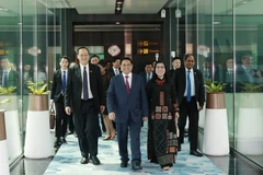 Thủ tướng Phạm Minh Chính và Phu nhân kết thúc chuyến thăm chính thức nước Cộng hòa Singapore. (Ảnh: Dương Giang/TTXVN)