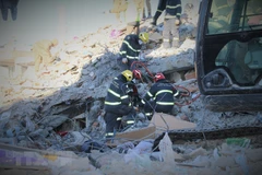 Đội cứu hộ công an Việt Nam thực hiện nhiệm vụ tại Thổ Nhĩ Kỳ. (Ảnh: Trường Dụy/TTXVN)