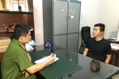 Đối tượng Huỳnh Hữu Tường tại Cơ quan Điều tra. (Ảnh: TTXVN phát)