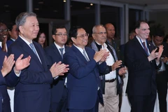 Thủ tướng Phạm Minh Chính và các đại biểu tham dự chiêu đãi kỷ niệm 78 năm Quốc khánh và 46 năm Việt Nam gia nhập Liên hợp quốc. (Ảnh: Dương Giang/TTXVN)