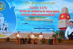 Các đại biểu tham gia giao lưu. (Ảnh: Nguyễn Cúc/TTXVN)