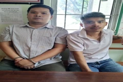 Đối tượng Trần Công Minh (trái) và Võ Gia Quyến. (Ảnh: TTXVN phát)