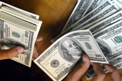 Đồng USD. (Nguồn: AFP/TTXVN)