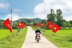 Đường cờ Tổ quốc tại thôn 4, xã Cư Êwi, huyện Cư Kuin, tỉnh Đắk Lắk chào mừng kỷ niệm 78 năm Quốc khánh nước Cộng hòa Xã hội Chủ nghĩa Việt Nam. (Ảnh: TTXVN phát)