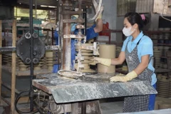 Công nhân tại một doanh nghiệp ở Yên Bái. (Nguồn: Vietnam+)