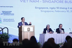 Thủ tướng Phạm Minh Chính phát biểu tại Diễn đàn Doanh nghiệp Việt Nam-Singapore. (Ảnh: Dương Giang/TTXVN)