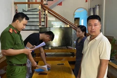 Các đối tượng cho vay lãi nặng bị công an bắt giữ. (Nguồn: Công an Nhân dân)