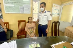 Đối tượng Nguyễn Việt Trinh tại cơ quan công an. (Nguồn: TTXVN)