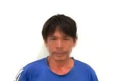 Đối tượng Thuận tại cơ quan chức năng. (Ảnh: TTXVN phát)