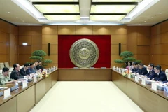 Tổng Thư ký, Chủ nhiệm Văn phòng Quốc hội Bùi Văn Cường hội đàm với Tổng thư ký Thượng viện Campuchia Oum Sarith. (Ảnh: Phạm Kiên/TTXVN)