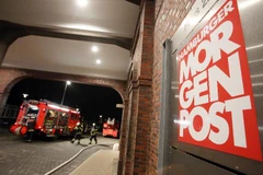 Nhật báo Đức đăng hình biếm họa của Charlie Hebdo bị phóng hỏa