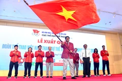 Cục trưởng Cục Thể dục Thể thao Đặng Hà Việt (giữa) đảm nhận vai trò Trưởng đoàn của Đoàn Thể thao Việt Nam tham dự Olympic Paris 2024. (Ảnh: Cục TDTT)