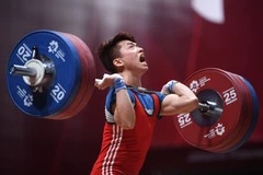 Đô cử Trịnh Văn Vinh là một trong những niềm hy vọng của Thể thao Việt Nam trong cuộc đua giành vé tham dự Olympic Paris 2024. (Ảnh: TTXVN)